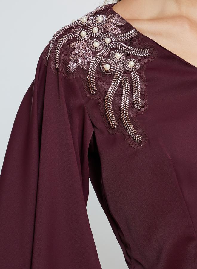 ستايلي طقم منسق من بنطال بأرجل واسعة وبلوزة منمقة - Image 3